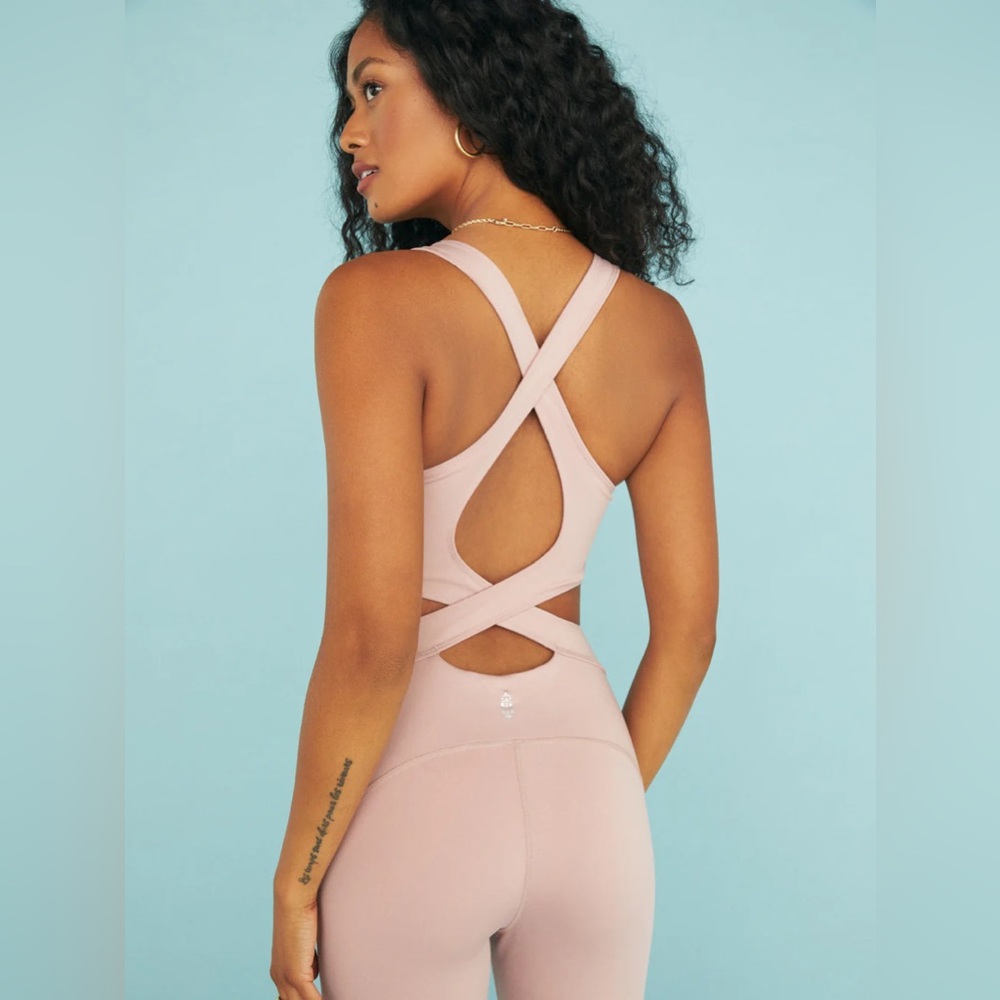 Free People Movement Back It Up Jumpsuit in Mauve Swoon, Size Medium.